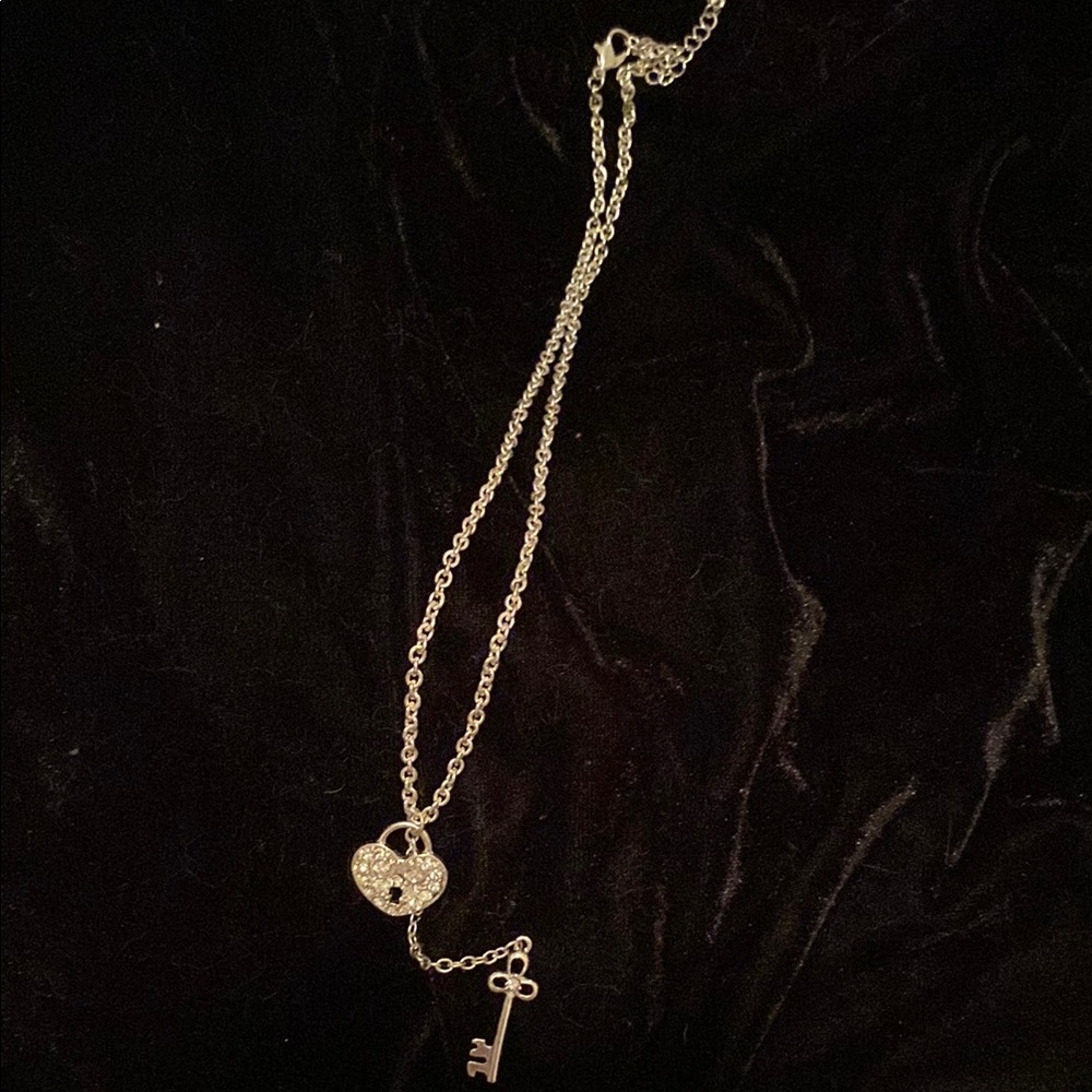 Vintage silvertone key and heart necklace.